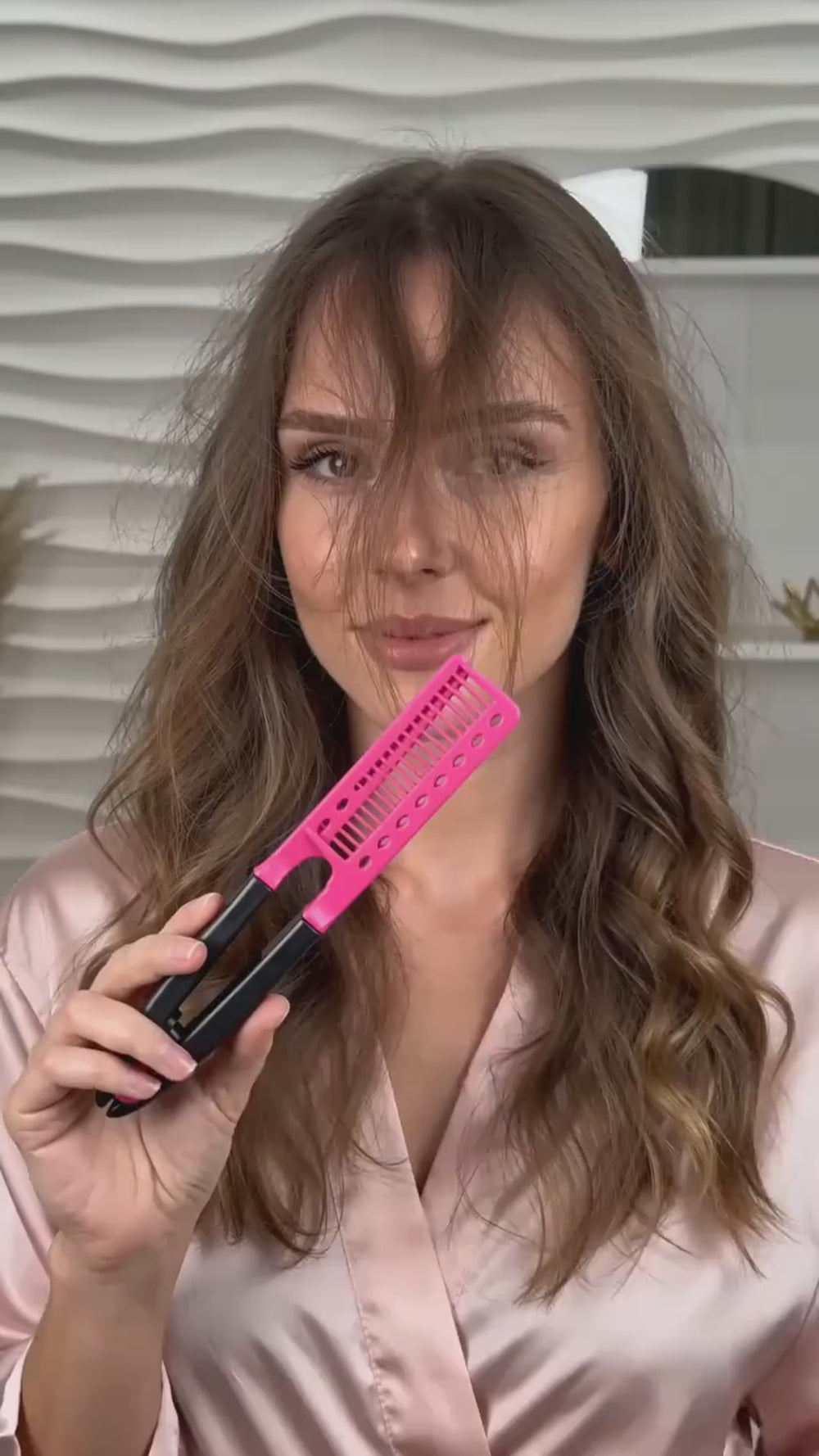 Clamp, glide and watch the frizz disappear